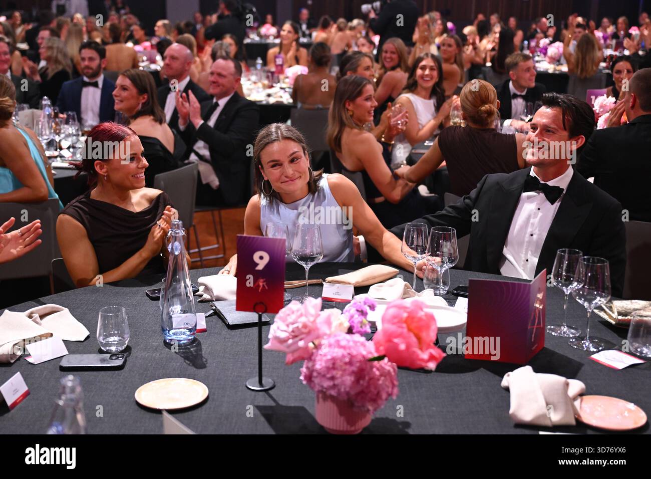 Ash Riddell of North Melbourne (centre) reacts after wining the best ...