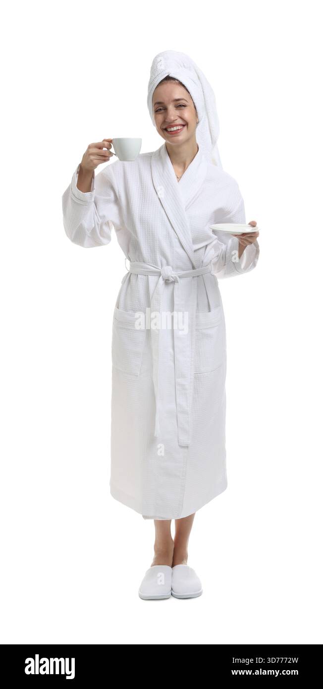 Woman in bathrobe with cup of coffee on white background Stock Photo - Alamy