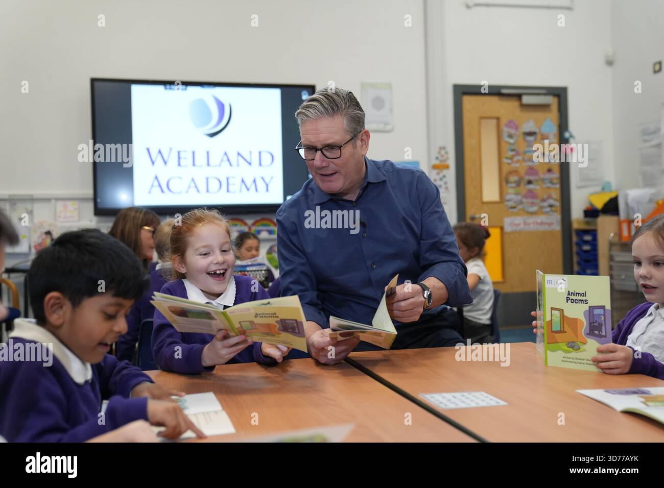 prime-minister-sir-keir-starmer-reads-with-pupils-during-a-visit-to