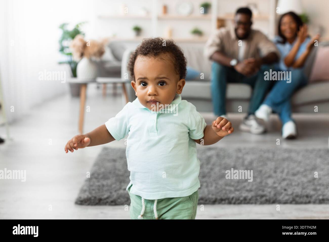 Child takes first steps walking hi-res stock photography and images - Alamy