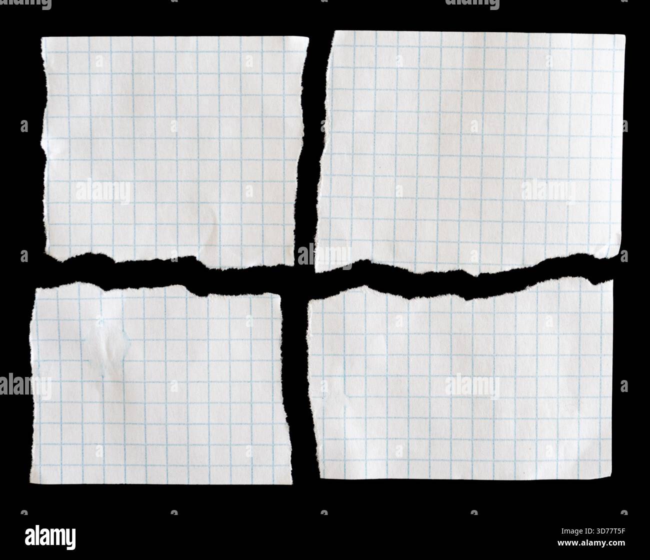 Notebook papers with torn edges on black background Stock Photo