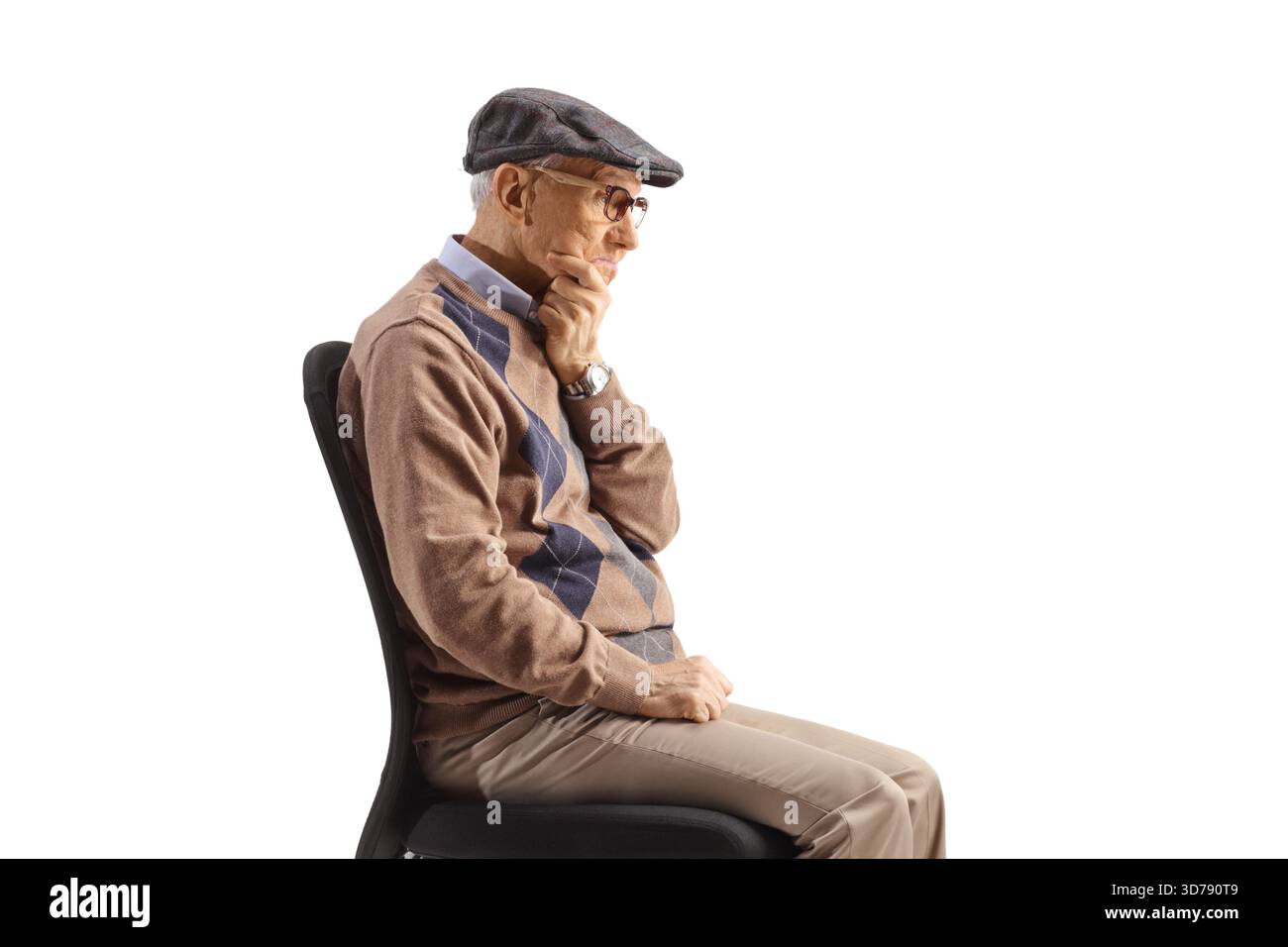 Elderly man sitting and thinking isolated on white background Stock Photo