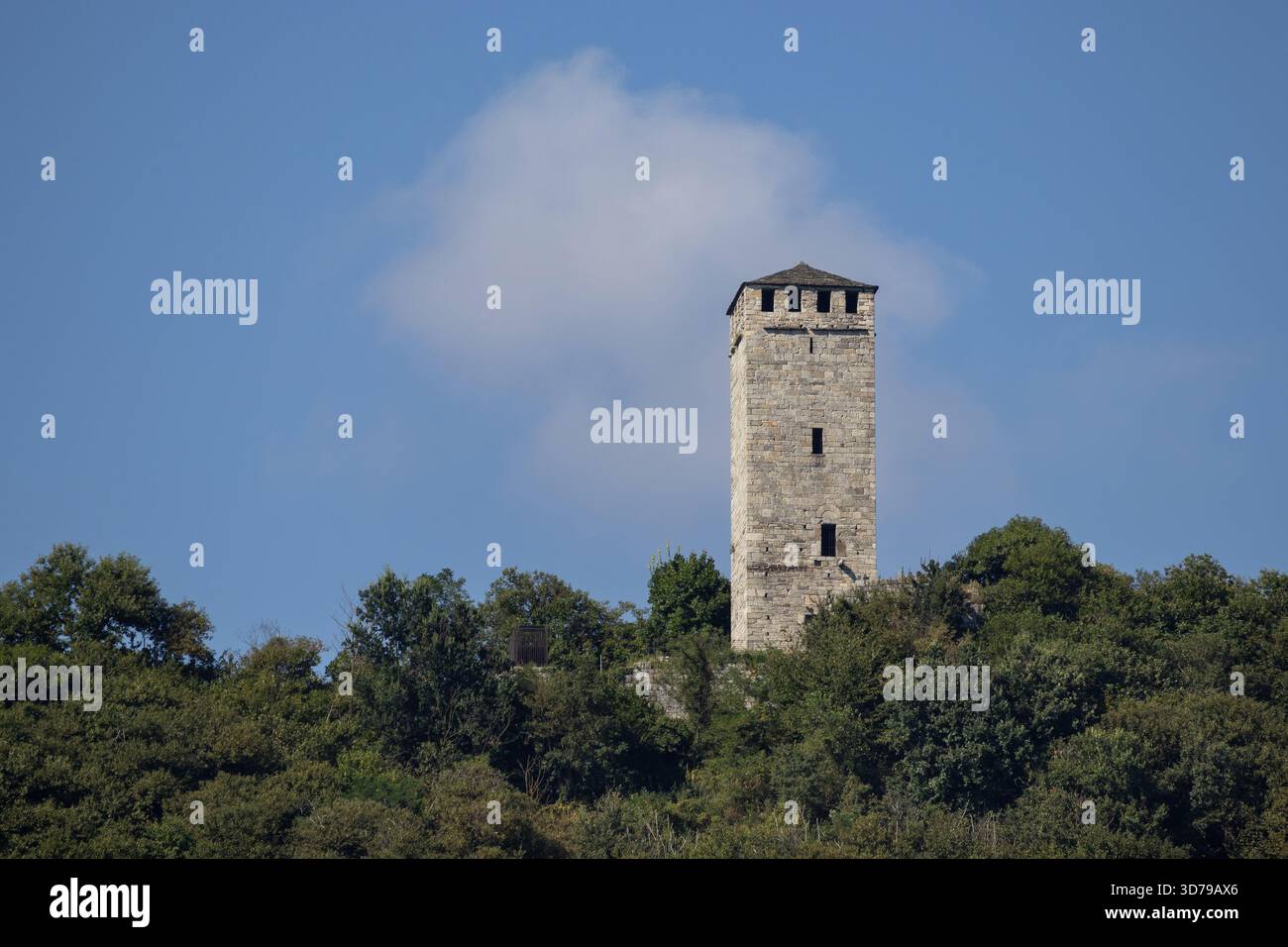 Tower of Buccione, a medieval tower owned by the municipality of Orta, on the shores of Lake Orta in Piedmont Italy. Copy space above. - Stock Image