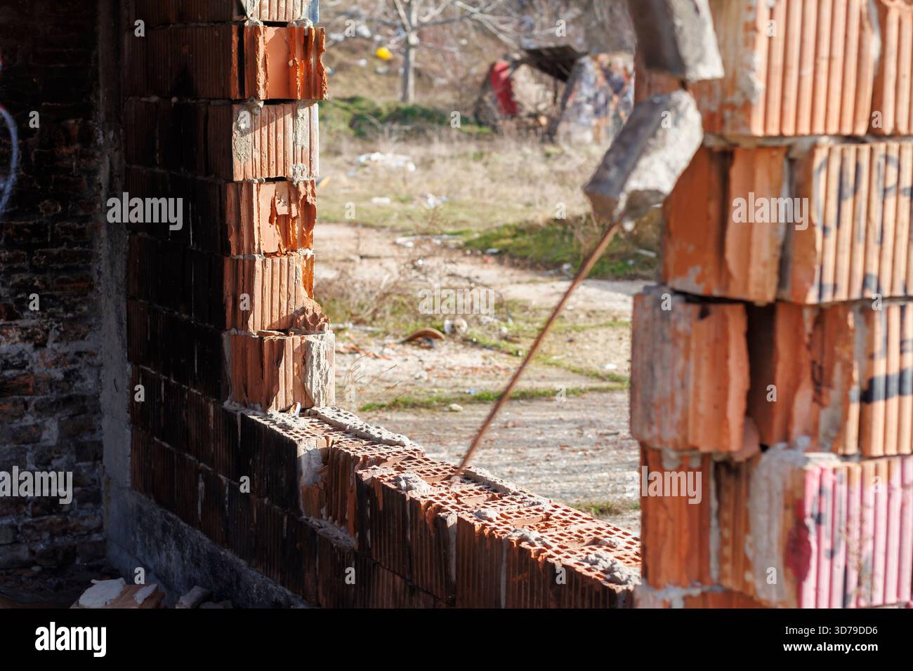 destroyed building after fire with large window Stock Photo