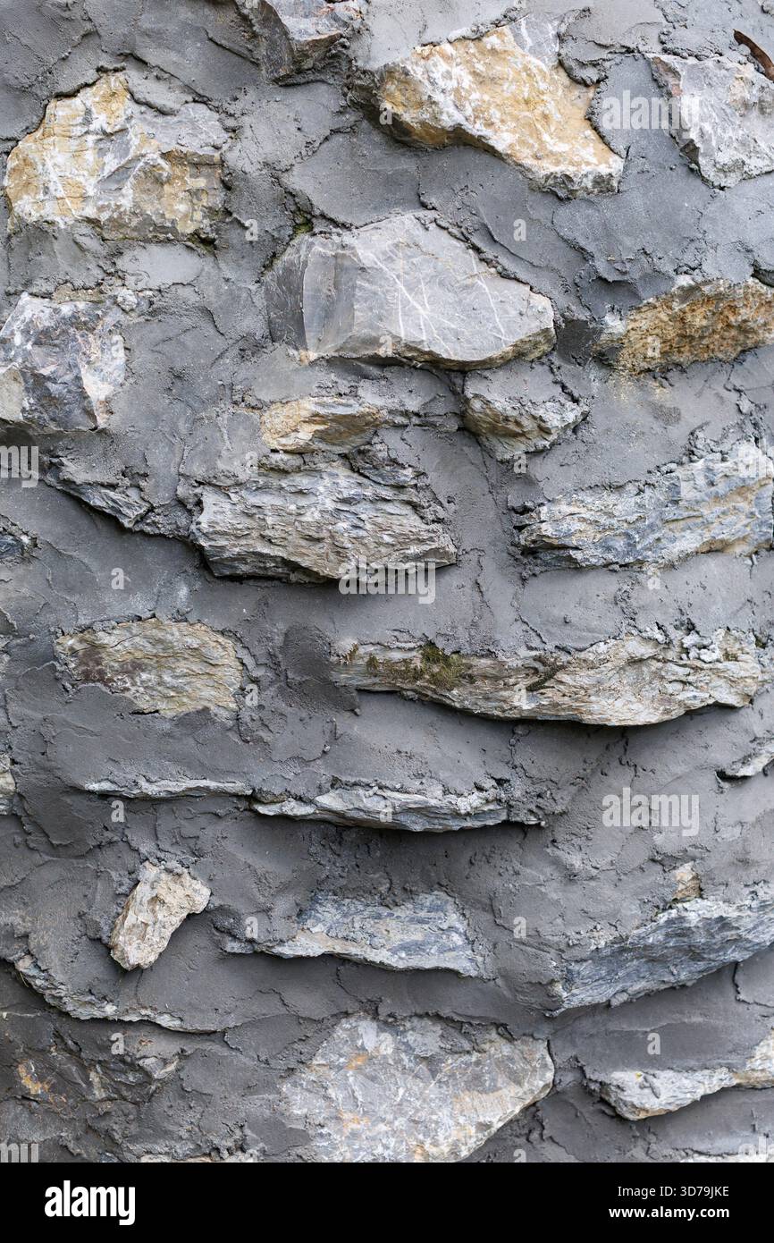 Stone wall texture with plaster background Stock Photo