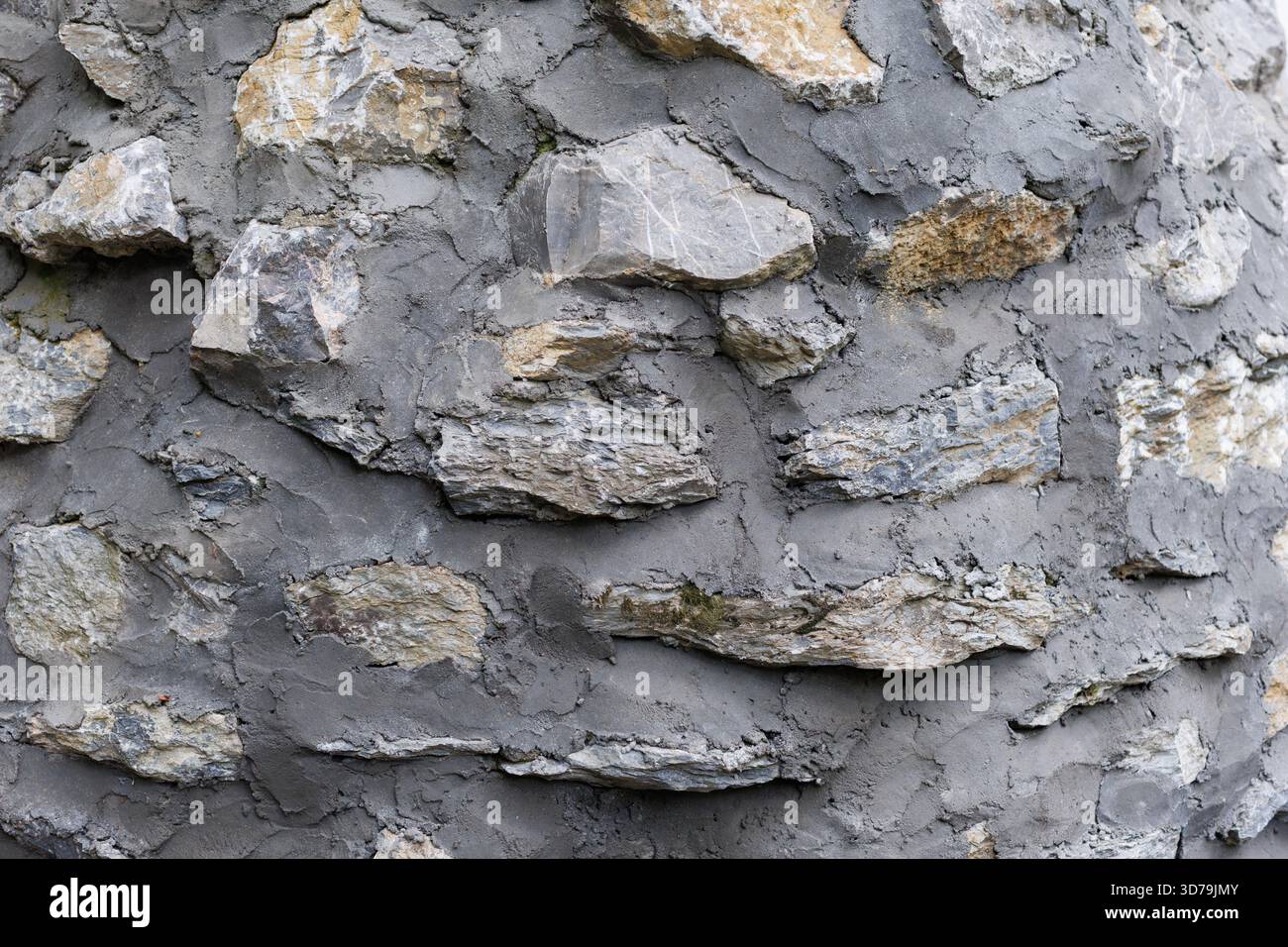 Stone wall texture with plaster background Stock Photo