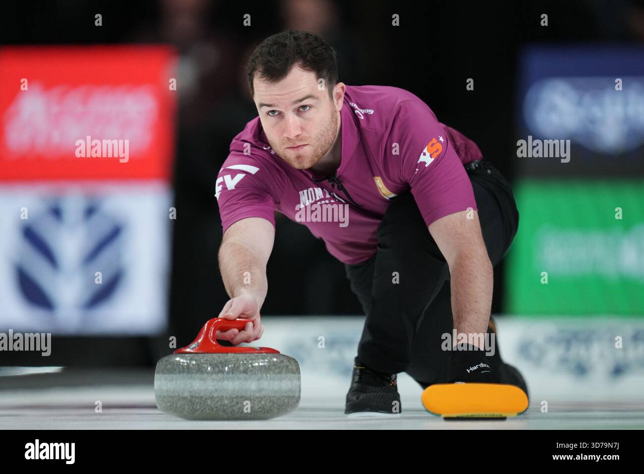 Rylan Kleiter throws a rock during Canadian Olympic curling trials ...