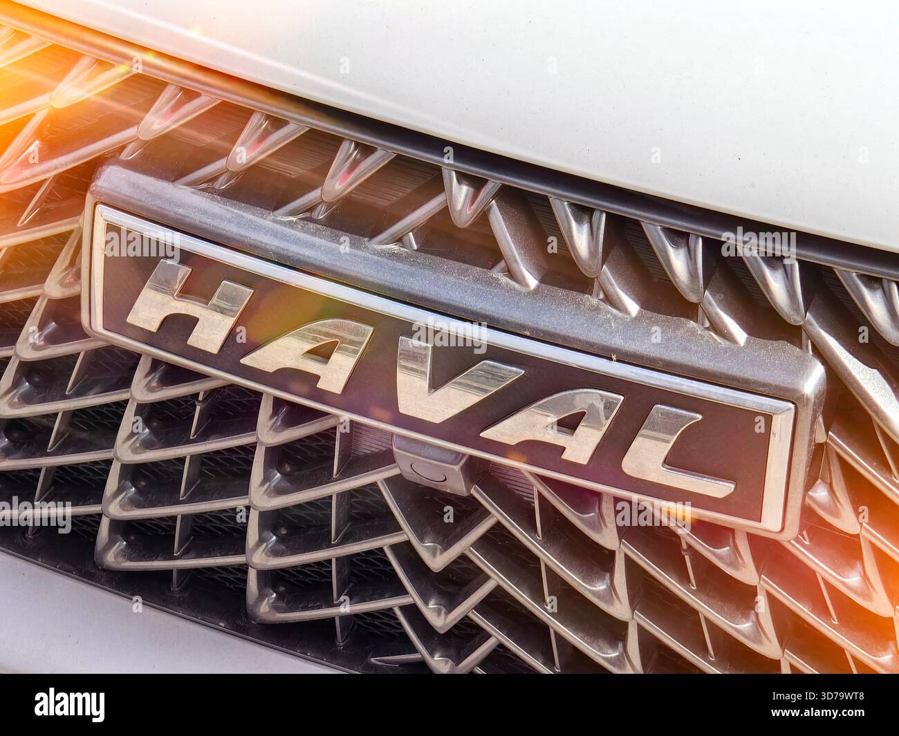 Haval logo. A high-quality photograph of a modern car featuring the ...