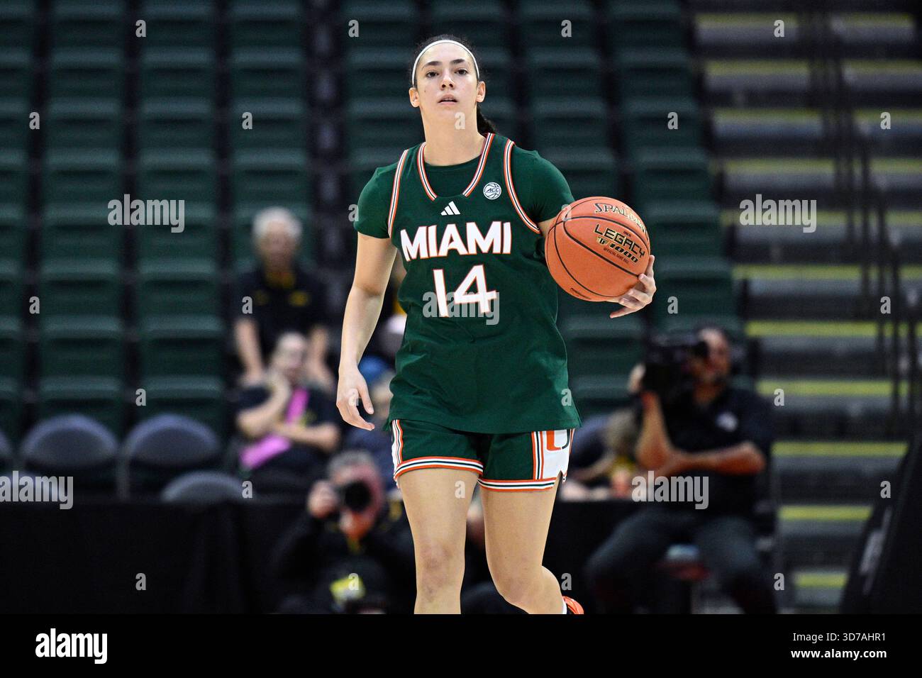 Miami guard Gal Raviv (14) brings the ball up the court during an NCAA ...