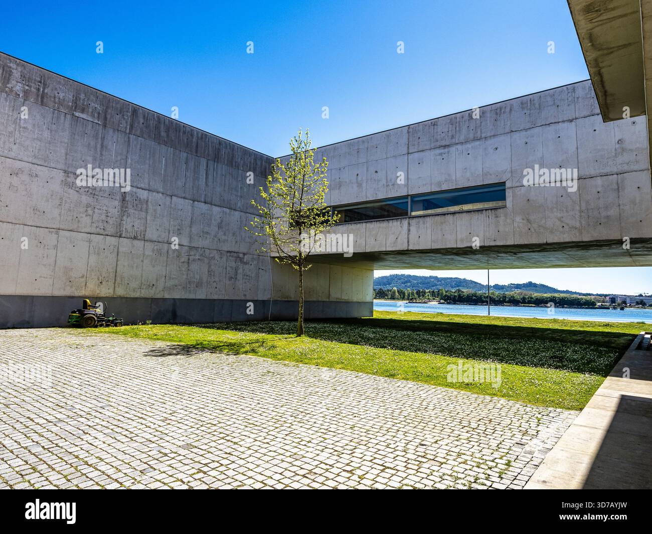 Biblioteca Municipal, Municipal Library at Viana do Castelo, Portugal.  Modern Architecture library outdoor with stairs leading to still water lake  mak Stock Photo - Alamy
