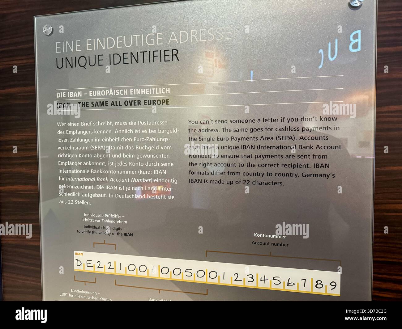 Exhibit panel detailing banknote unique identifiers and serial ...