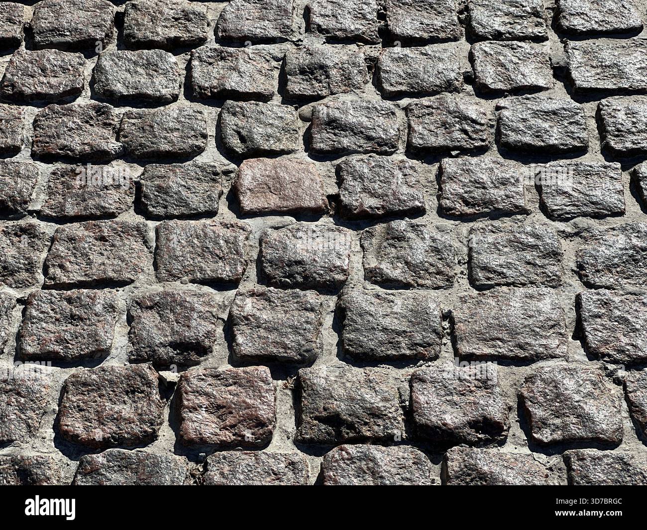 Pavement stone block paving tiles Stock Photo