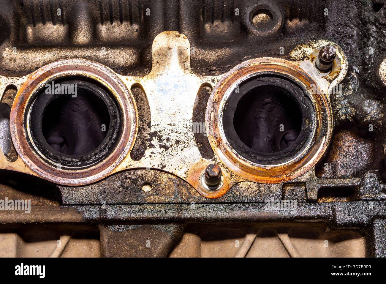 Thermal stress and fuel residue leave visible crust and pitting on ...
