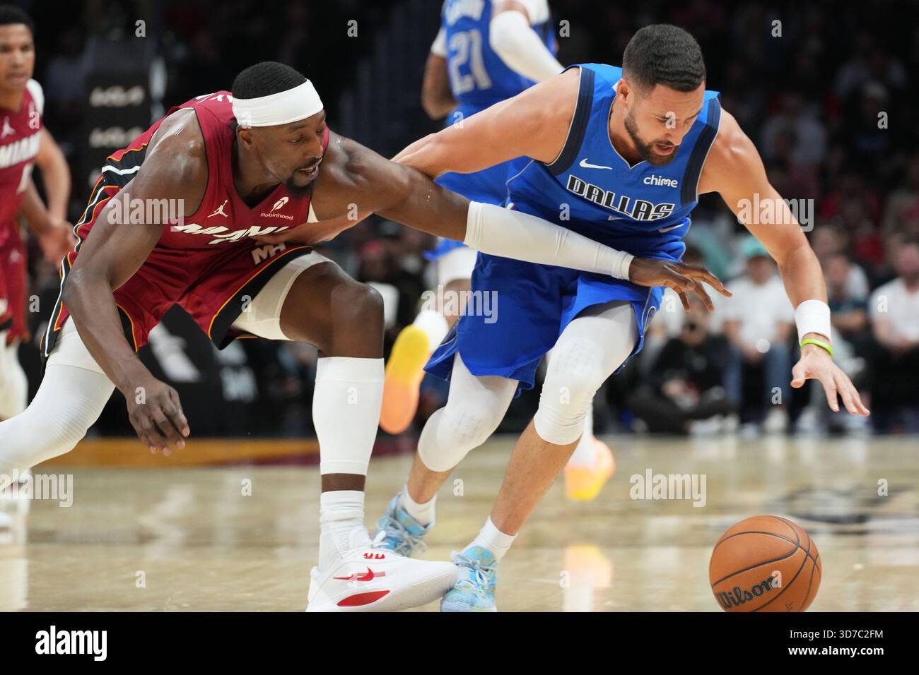 Miami Heat center Bam Adebayo (13) and Dallas Mavericks guard Klay