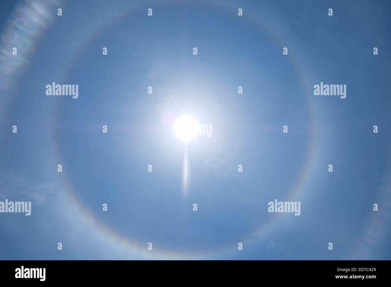 Sun halo in the blue sky Stock Photo