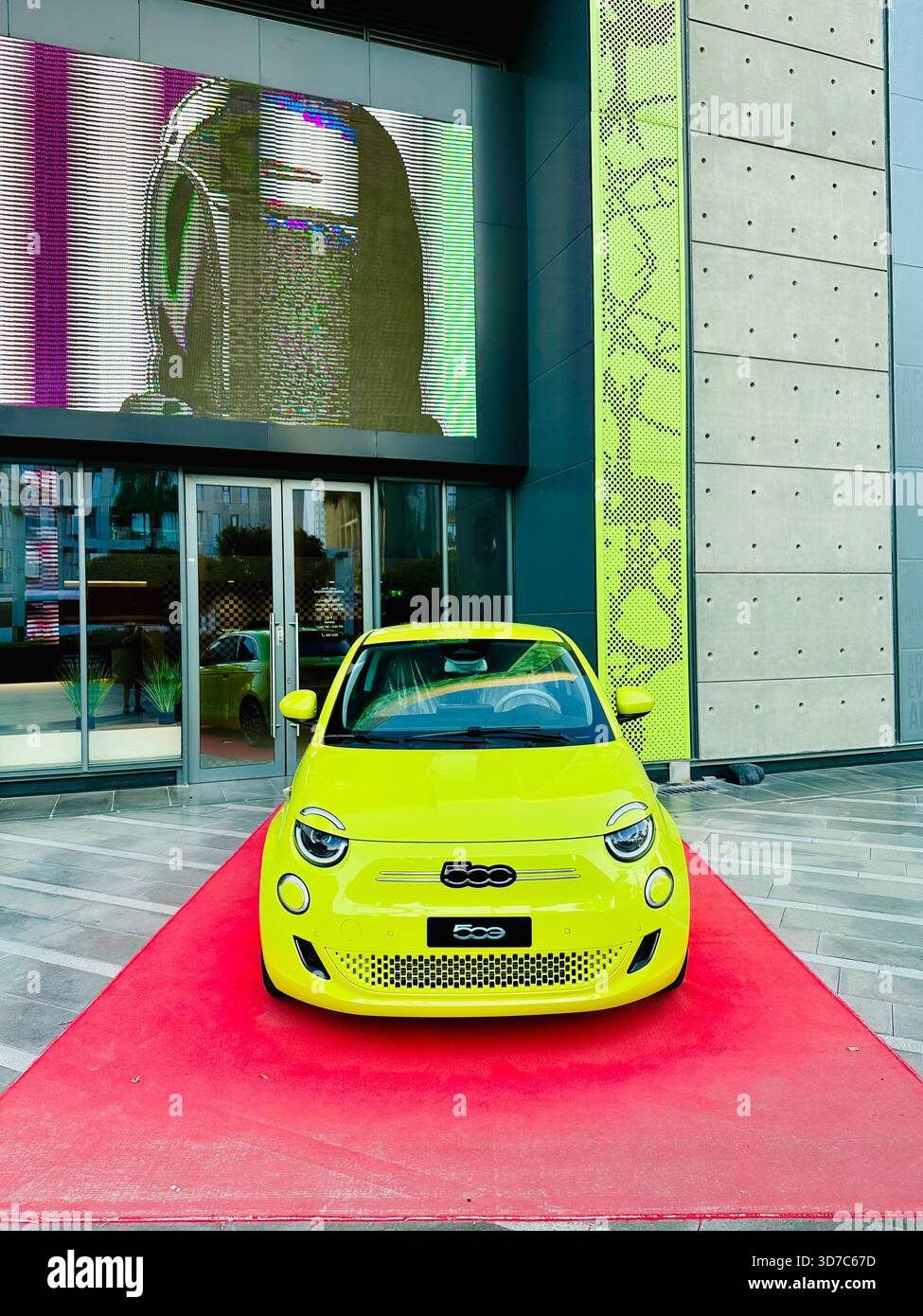 lime green yellow fiat 500 car - Smartphone Captured Stock Image