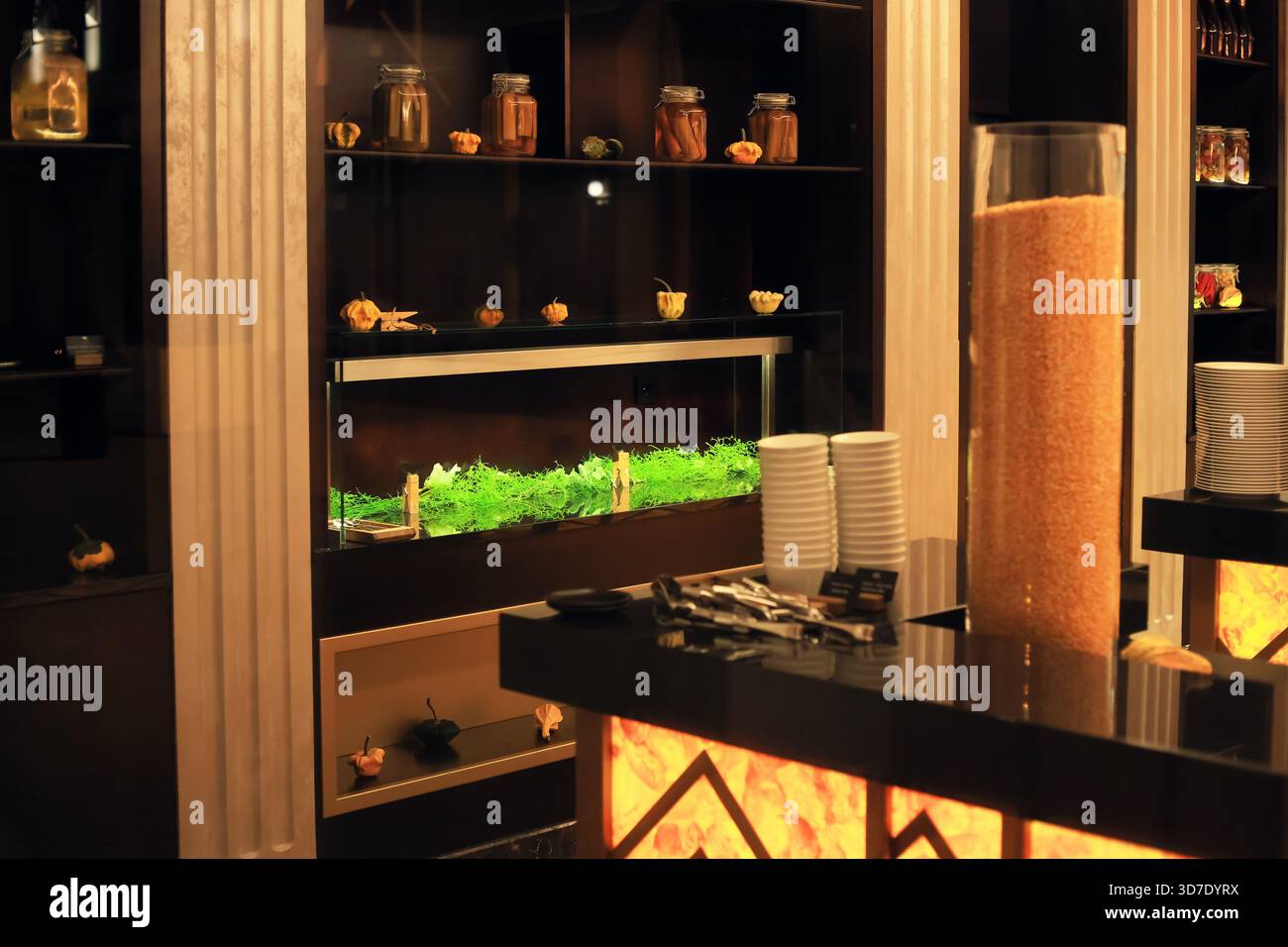 Hotel breakfast buffet counter with cereal dispenser, stacked bowls ...