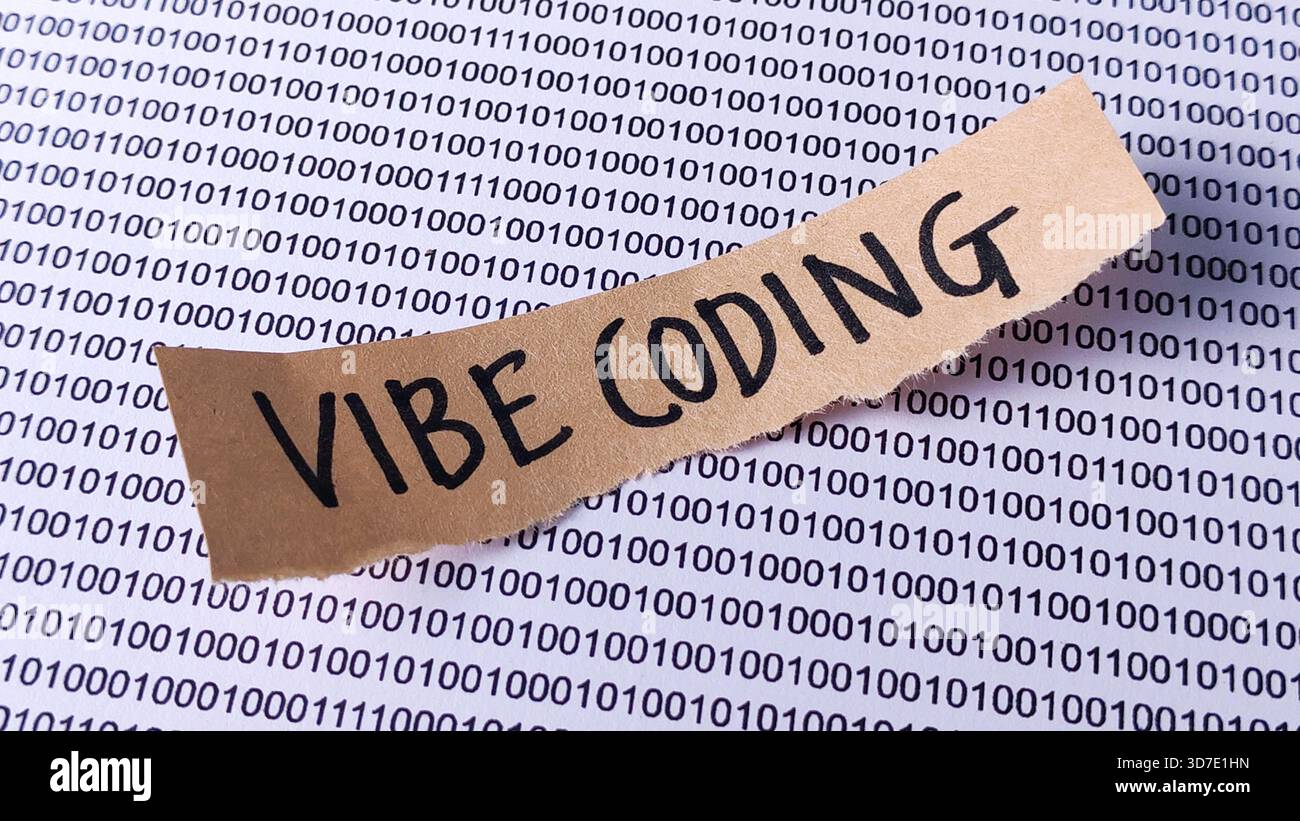 "Vibe Coding" Note on Binary Code: Software Development Culture, Programming, and Digital Concept Stock Photo