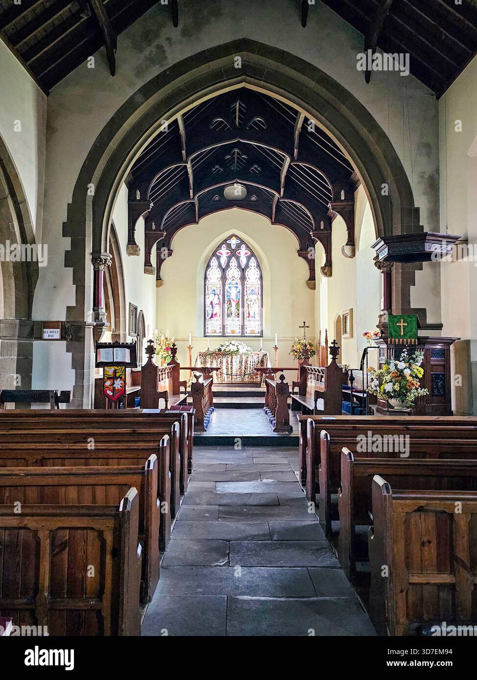 nterior of Holy Trinity Church, Ashford-in-the-Water, Peak District, Derbyshire. Parts of the church date from the 12th century. - Smartphone Captured Stock Image