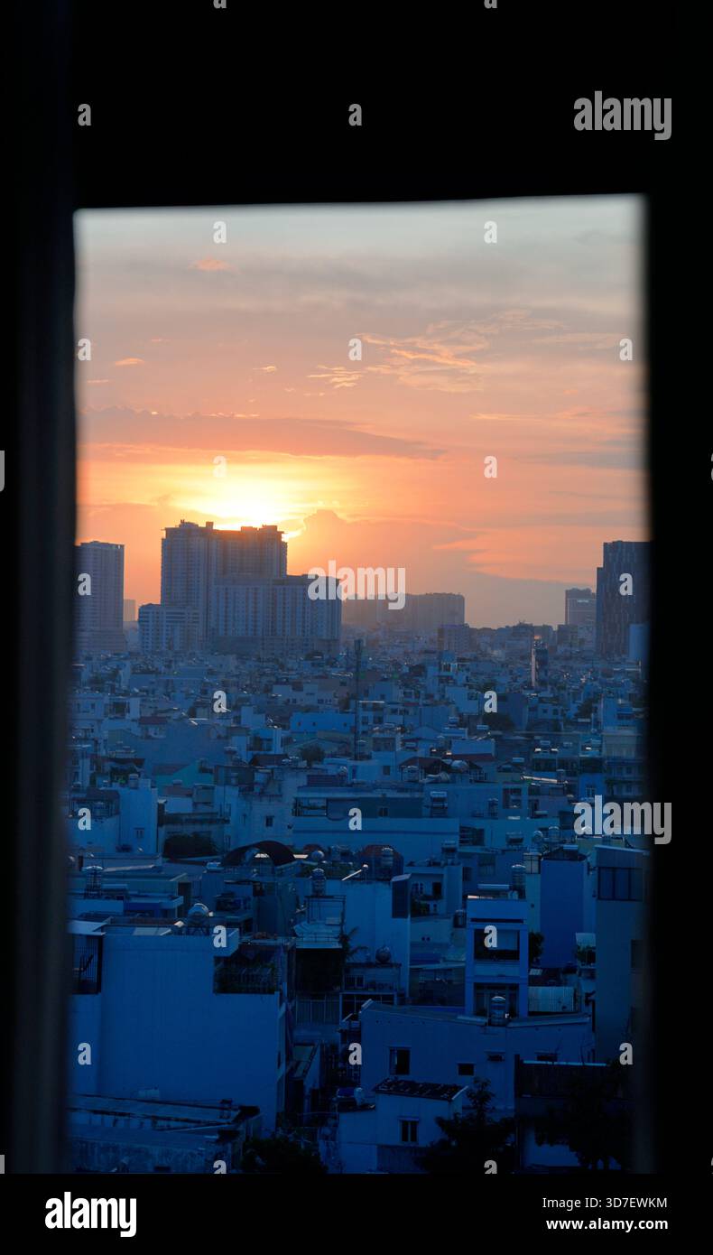Gradient golden sunset with blue shadow on buildings and residents ...