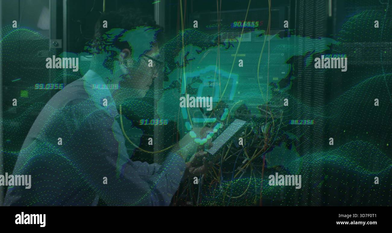 Inspecting Korean IT tech wearing light shirt tie checking tablet in data center with patch cables Stock Photo