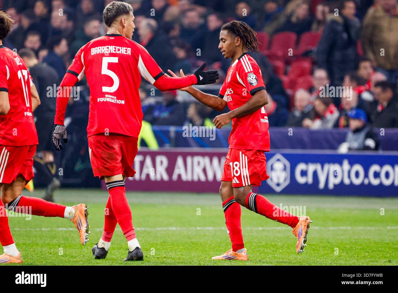 Leandro Barreiro of Benfica celebrates after scoring his teams second goal  Enzo Barrenechea of Benfica during the UEFA Champions League 2025/26 League  Phase MD5 match between AFC Ajax and SL Benfica at