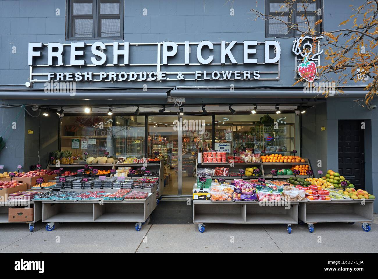 Independent grocery store with outdoor display of fruits and vegetables ...