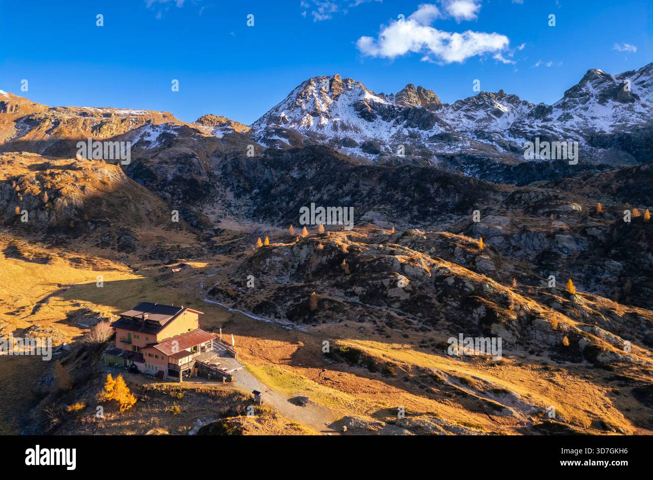 Aerial view of the Rifugio Calvi in autumn at sunset. Carona, Val Brembana, Alpi Orobie, Bergamo, Bergamo Province, Lombardy, Italy, Europe. Stock Photo