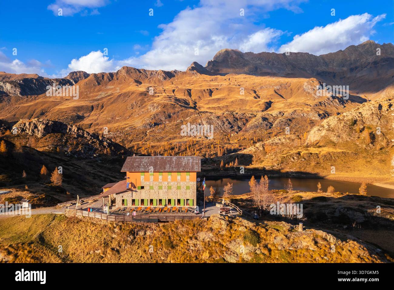 Aerial view of the Rifugio Calvi in autumn at sunset. Carona, Val Brembana, Alpi Orobie, Bergamo, Bergamo Province, Lombardy, Italy, Europe. Stock Photo