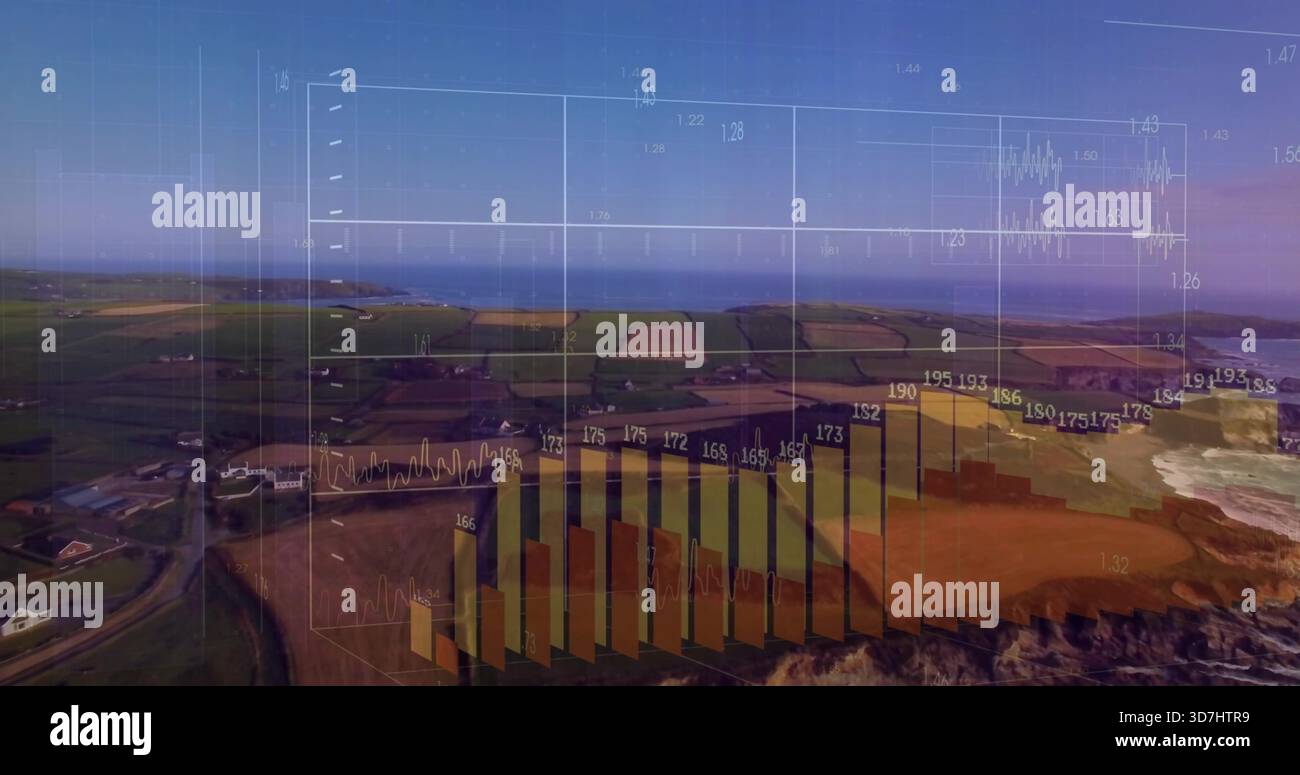 Showing translucent 3D data overlay centered over coastal fields and cliffs, with bar charts Stock Photo