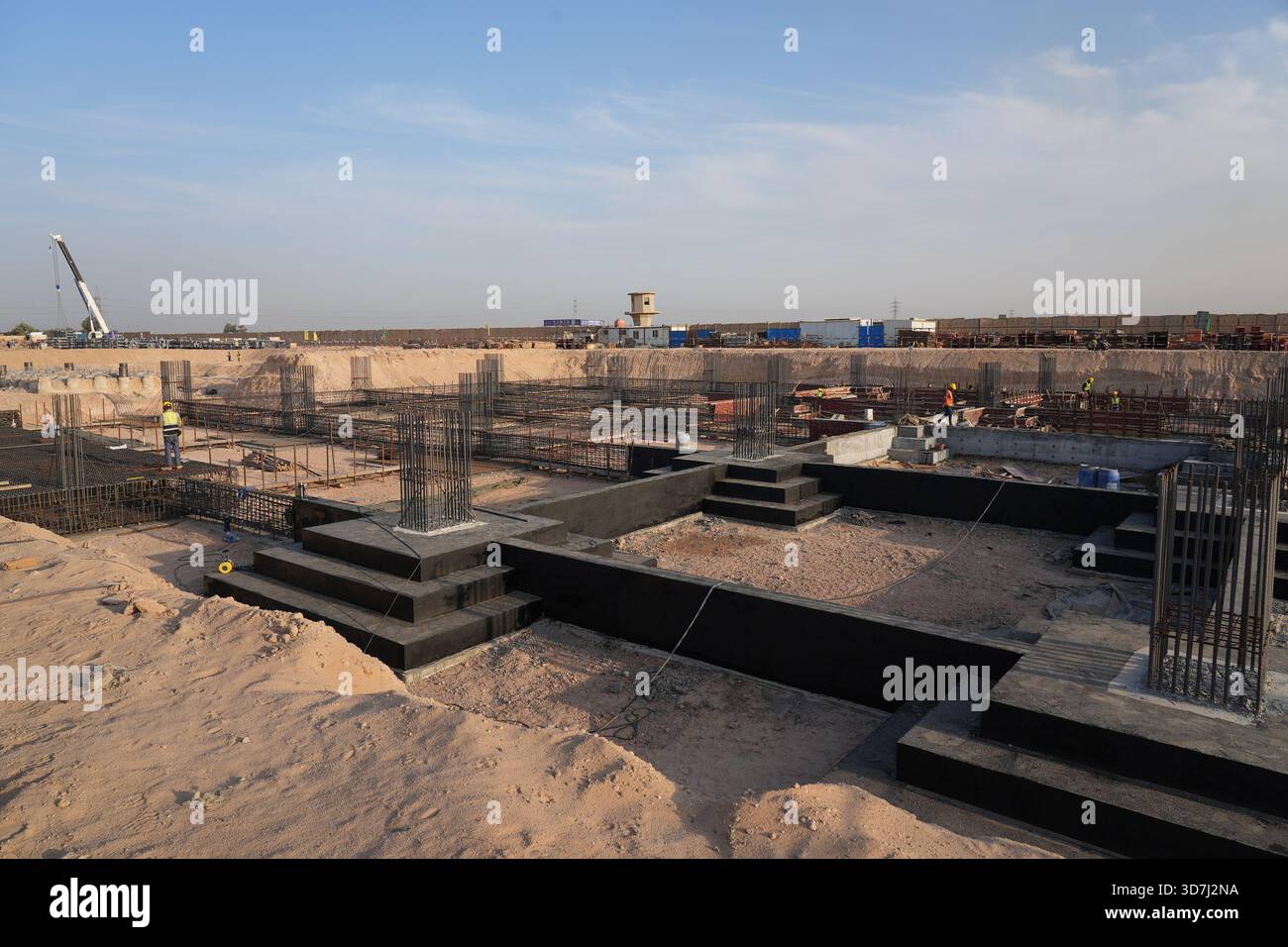 251126) -- BAGHDAD, Nov. 26, 2025 (Xinhua) -- Gao Shoujiang (L), executive  deputy manager of the Najaf 2Á9E Add-On Combine-Cycle Power Plant Project,  and Naseem Ayad, Najaf project manager on the Iraqi