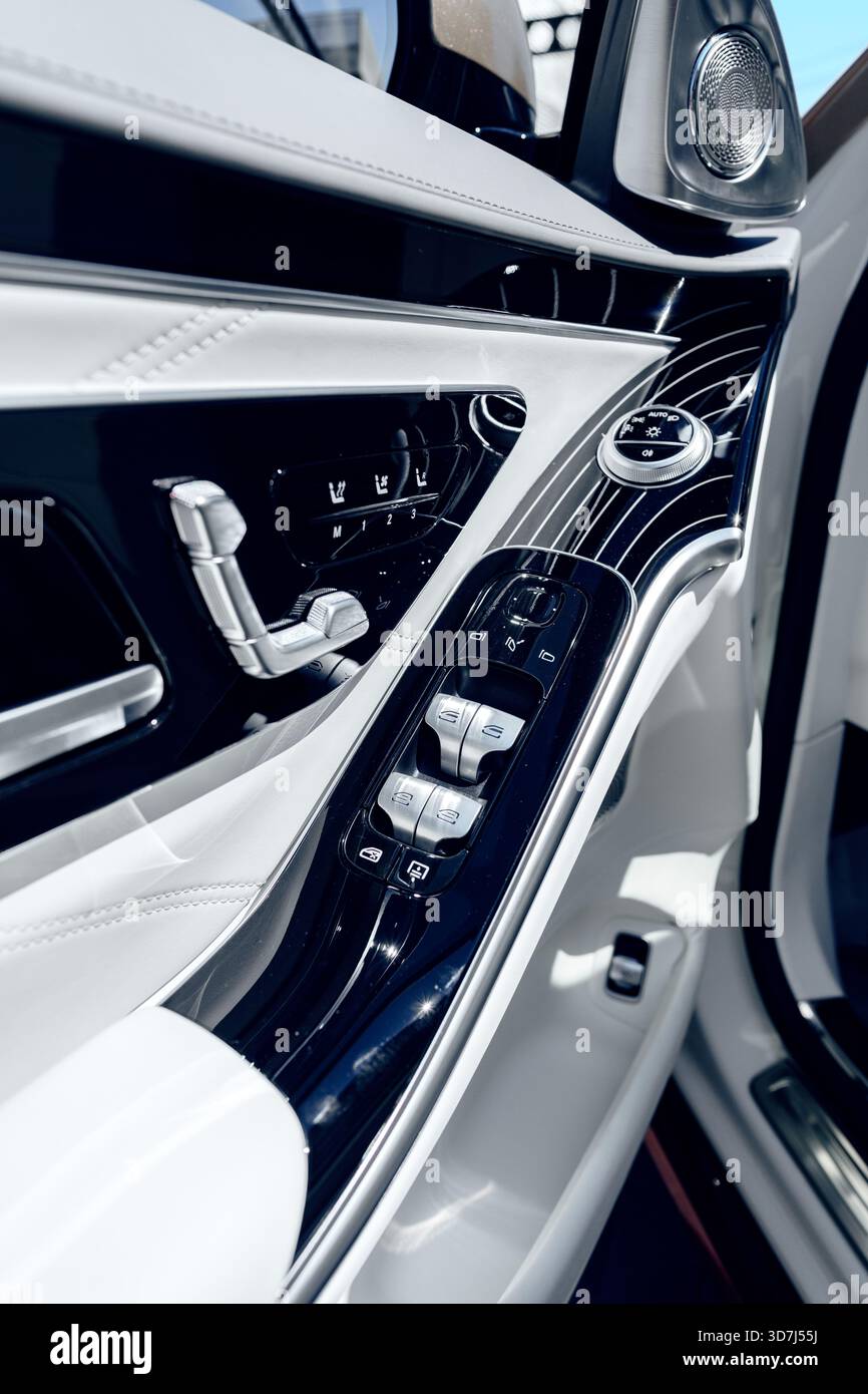 Details of an elegant car interior with modern controls and sleek ...