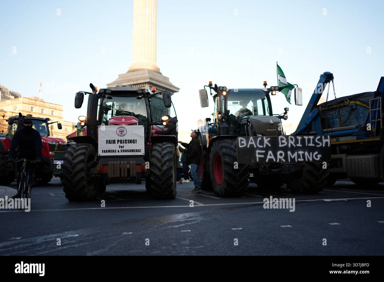 Farmers take part in a protest with their tractors in Westminster ...
