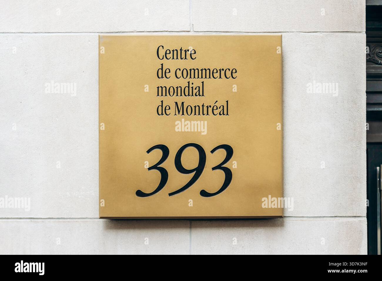Montreal, Canada - August 14, 2025: World Trade Centre Montreal, gold address plaque 393 in downtown Stock Photo