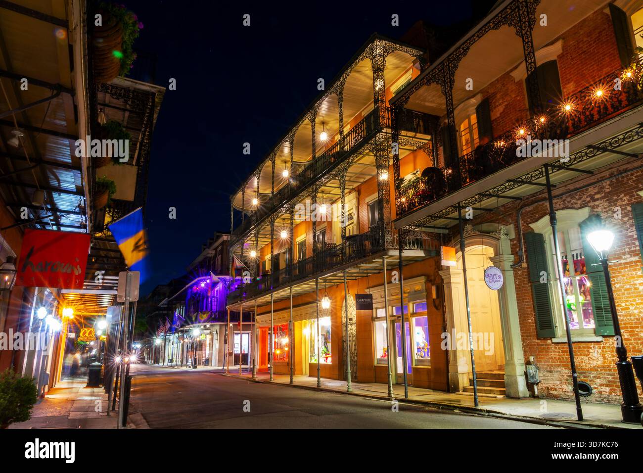 Buildings illuminated at night in Royal Street, French Quarter, NOLA ...
