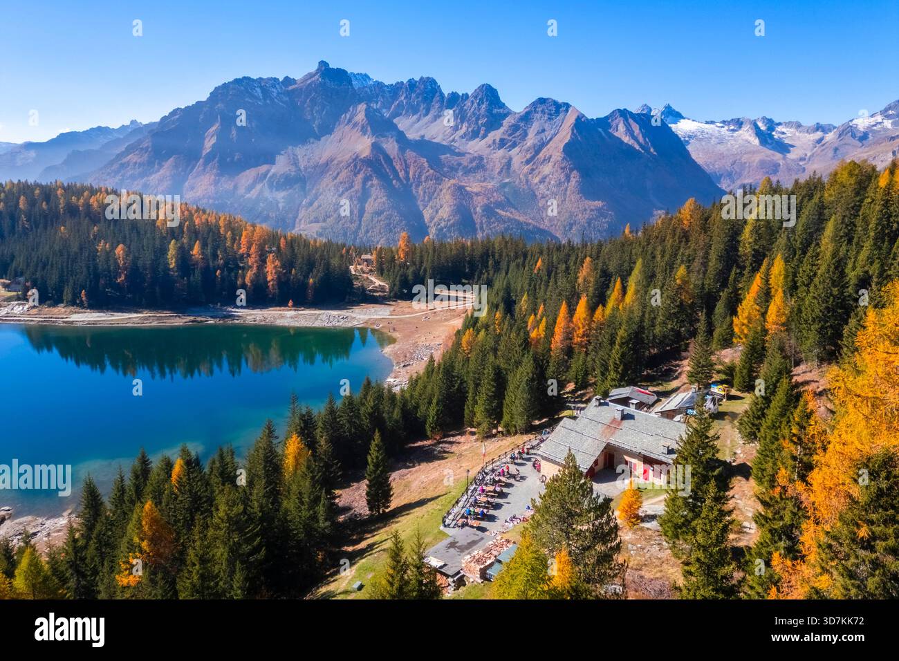 Aerial view of the Palù refuge and lake in autumn. Chiesa in Valmalenco, Valmalenco, Sondrio province, Valtellina, Lombardy, Italy, Europe. Stock Photo