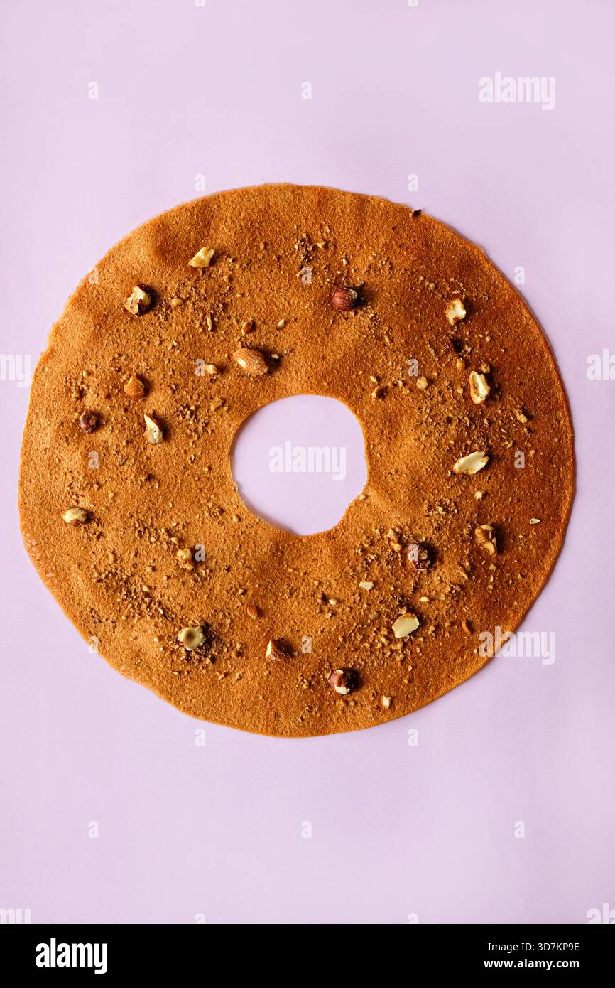Cozy homebaked hazelnut cookie with crumbly texture and clusters Stock Photo