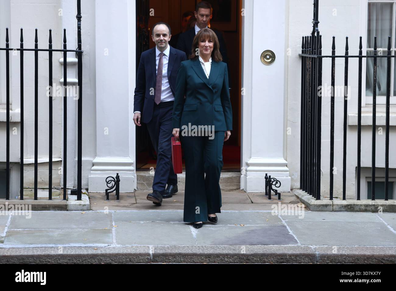 Chancellor of the Exchequer, Rachel Reeves, poses with the red Budget ...