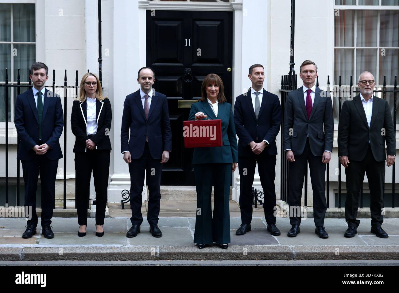 Chancellor of the Exchequer, Rachel Reeves, poses with the red Budget ...