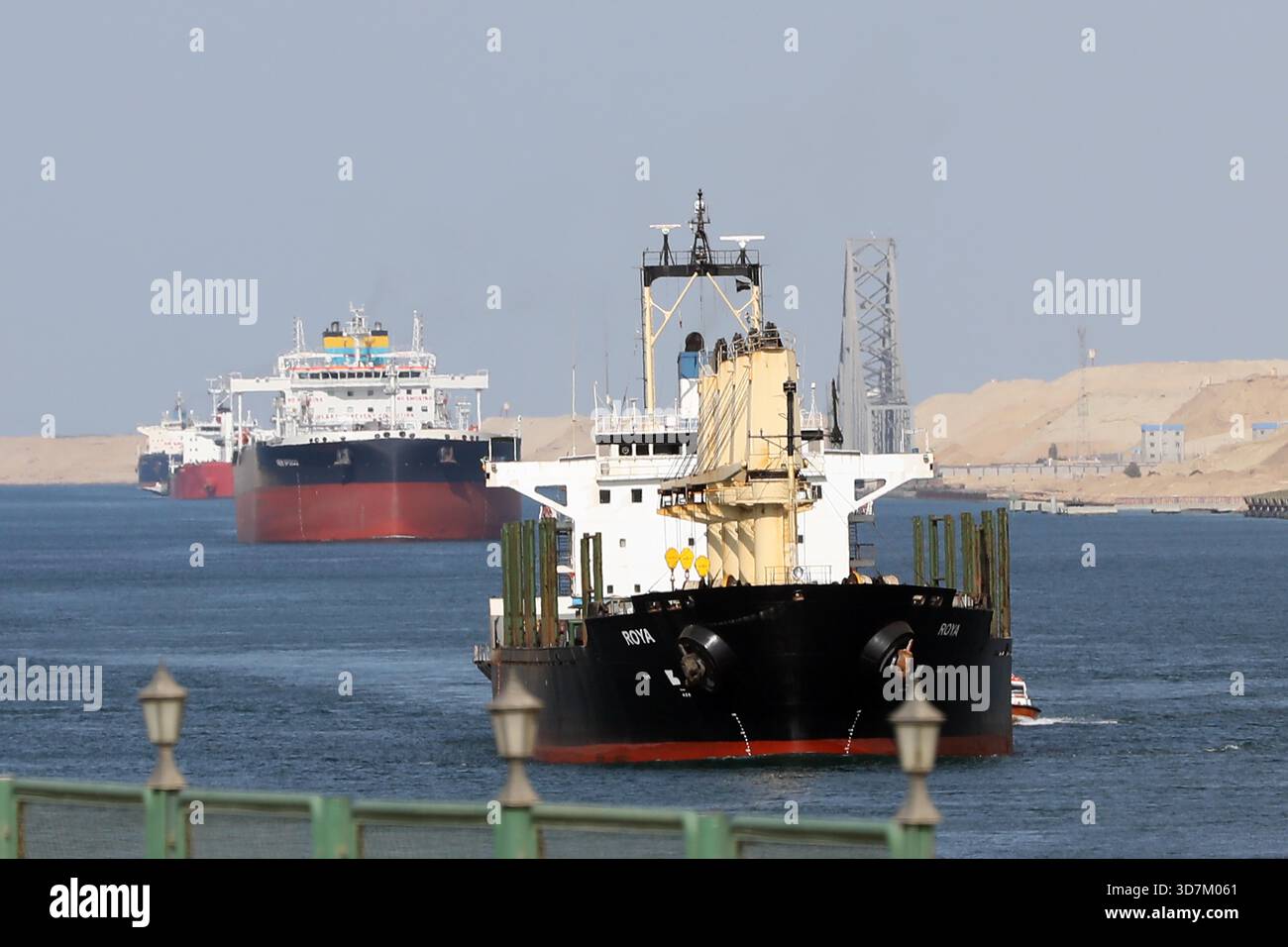 Cairo, Egypt. 25th Nov, 2025. Ships transit the Suez Canal in Ismailia ...