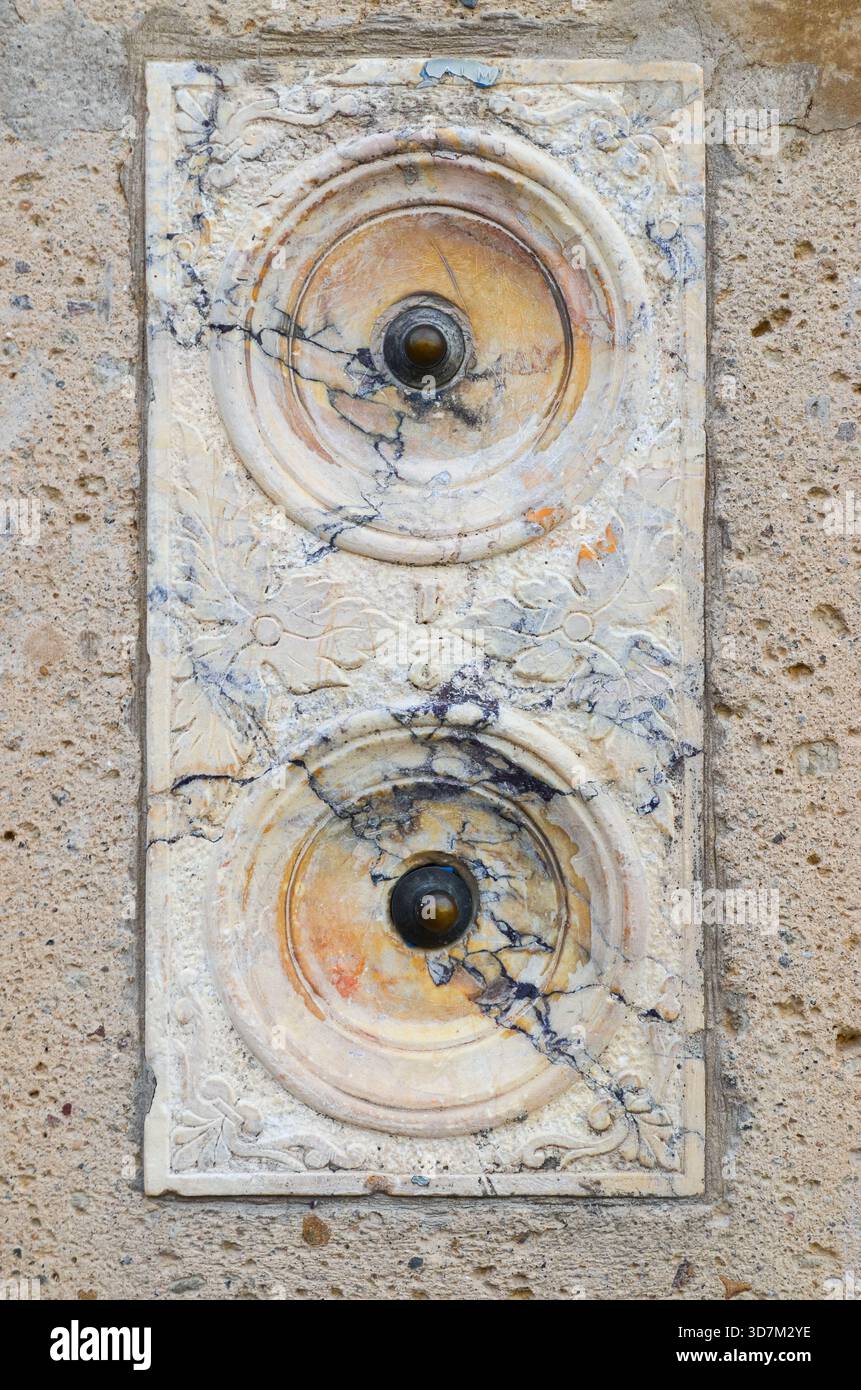 Old stone intercom doorbell Stock Photo