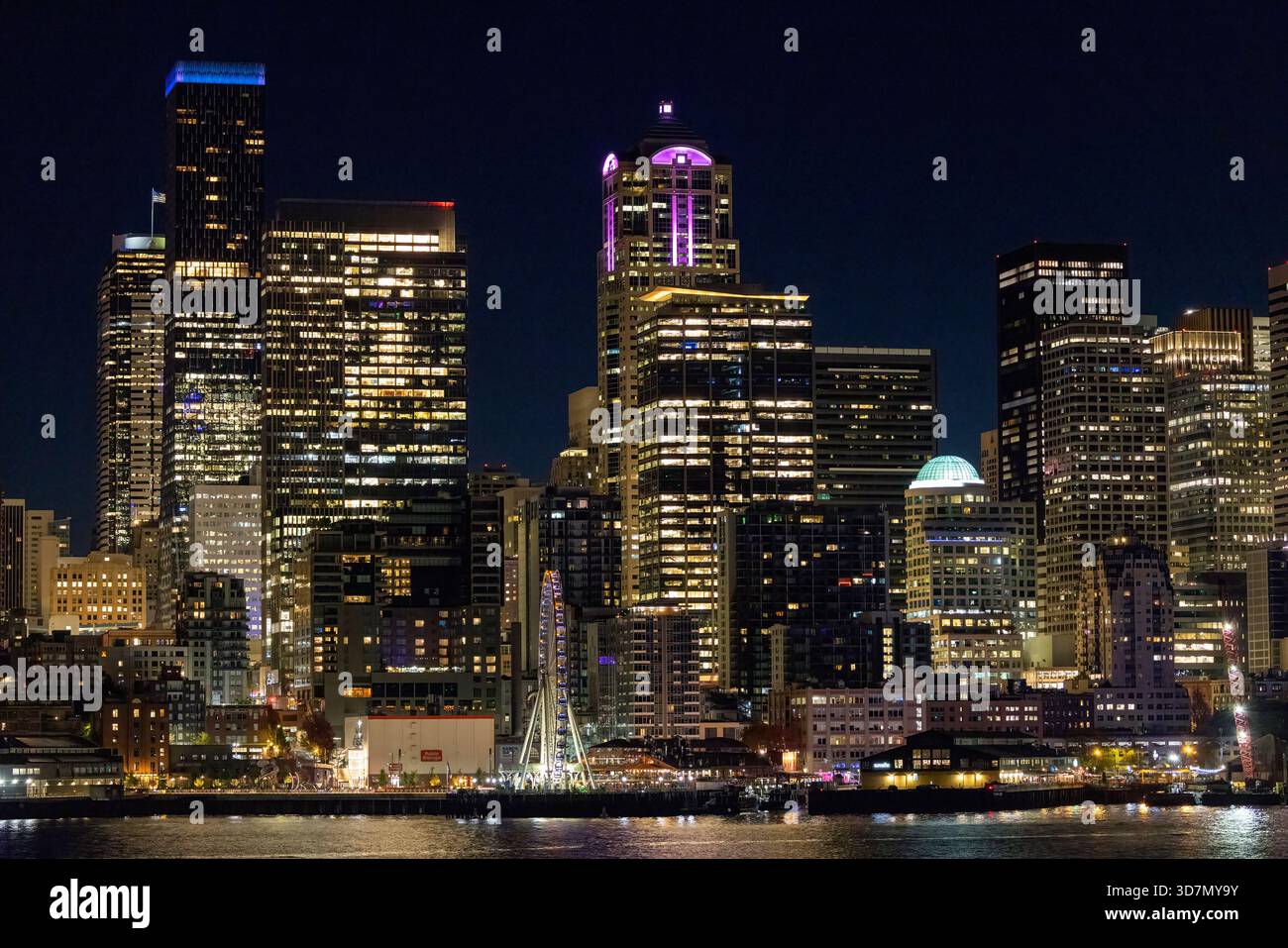 Downtown Seattle skyline at night viewed from the waterfront - Seattle, Washington, USA Stock Photo