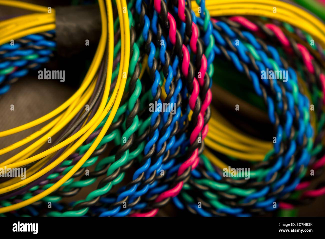Colorful wiring bundle close up view electrical cables . Stock Photo