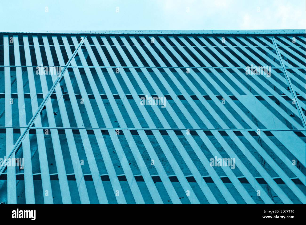 Striking modern building facade with a dynamic texture and pattern. Stock Photo