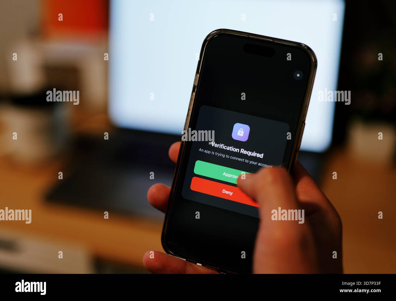 Man Uses Two Factor Authentication to Authorize Application Access Basic Enterprise Information Securtity Concept - 2FA MFA Mobile App Stock Photo