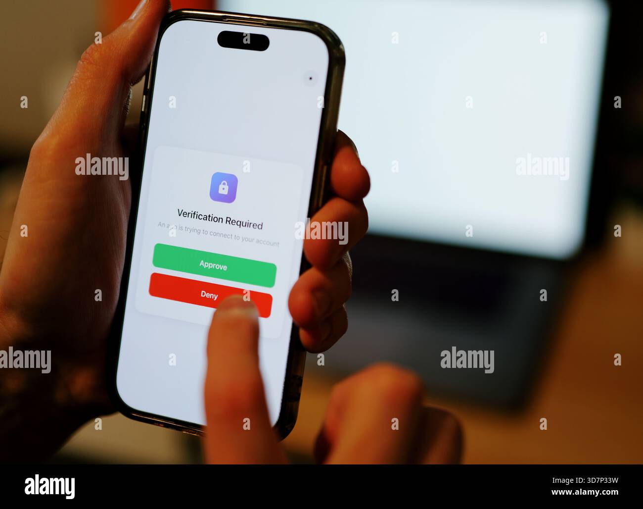 Man Uses Two Factor Authentication to Authorize Application Access Basic Enterprise Information Securtity Concept - 2FA MFA Mobile App Stock Photo