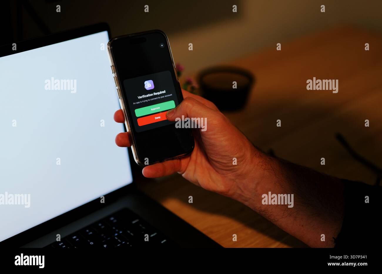 Man Uses Two Factor Authentication to Authorize Application Access Basic Enterprise Information Securtity Concept - 2FA MFA Mobile App Stock Photo