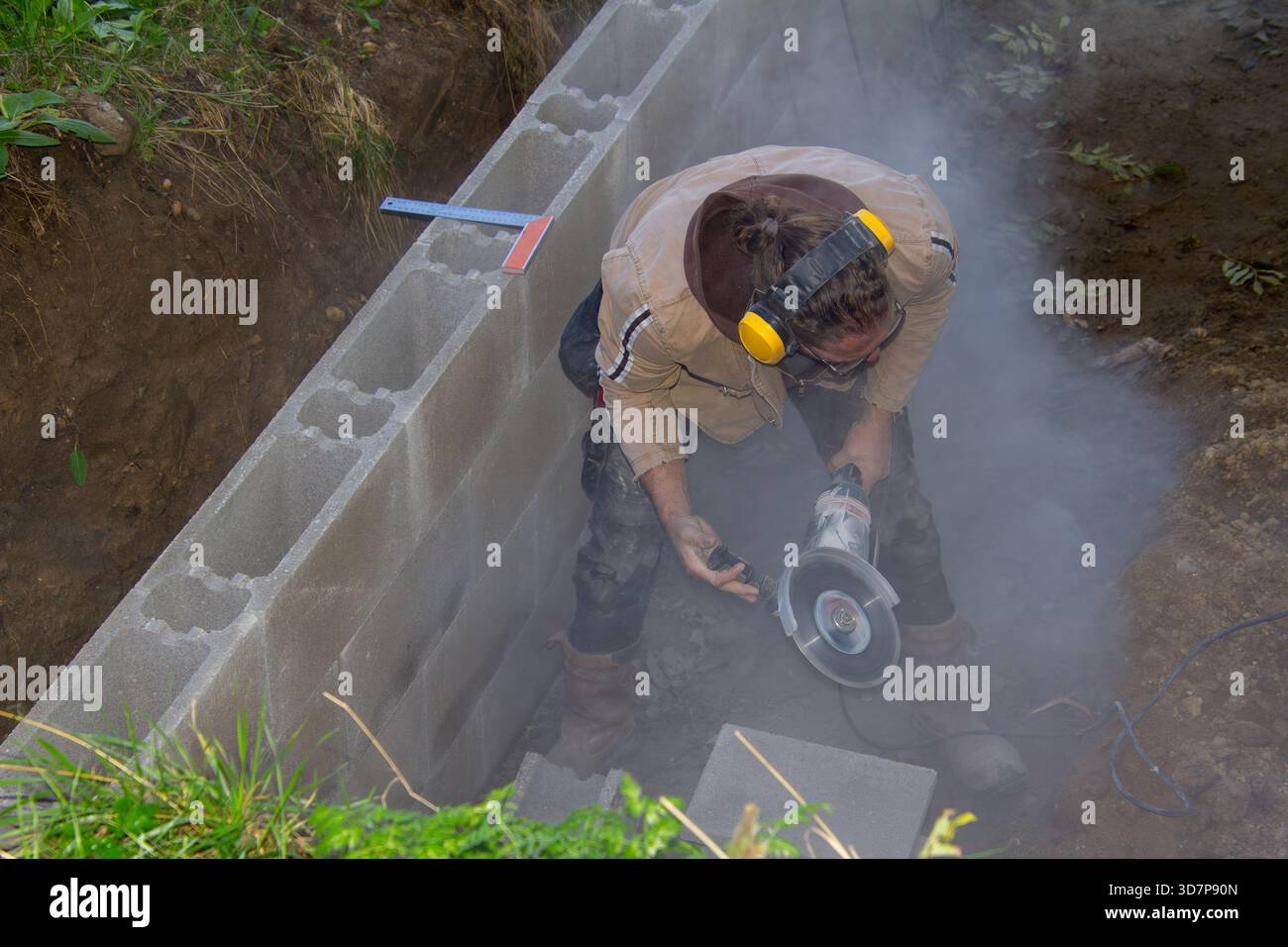 Grinding stones with an angle grinder Stock Photo