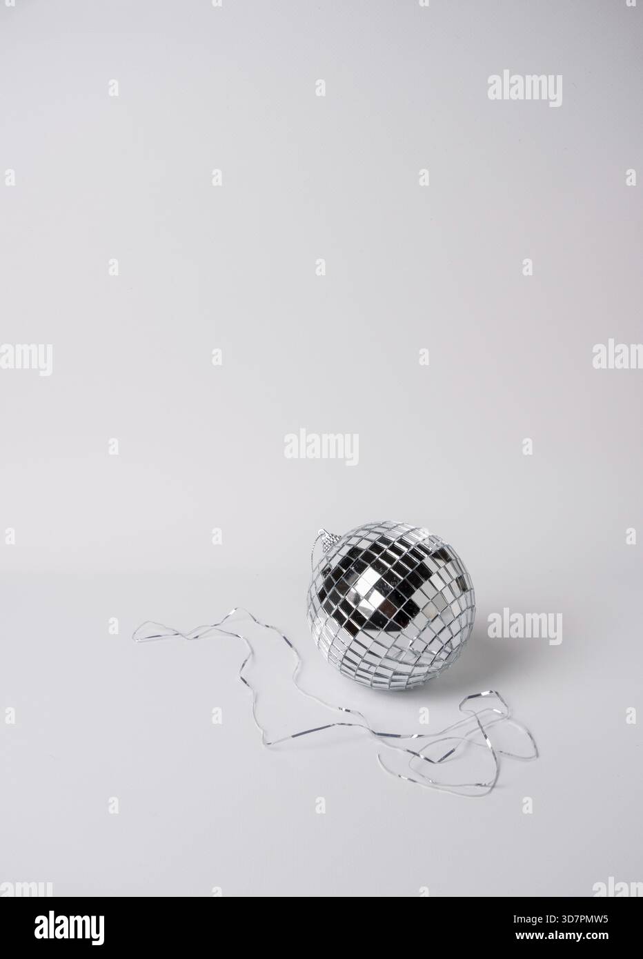 Silver disco ball on white background, space for text Stock Photo