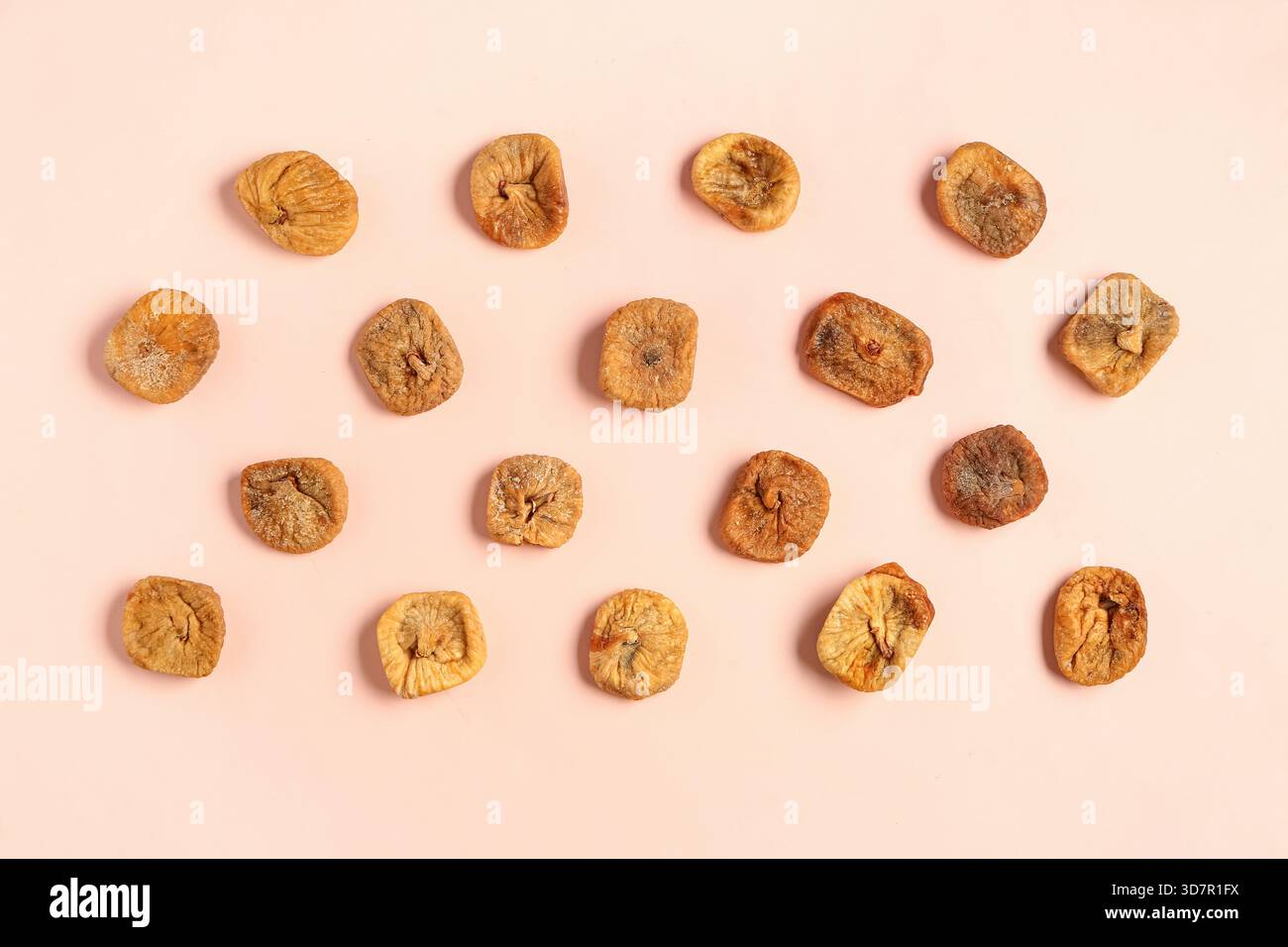 Sweet dried figs on orange background Stock Photo
